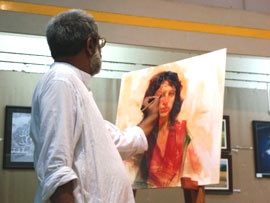 Demonstration of Portrait painting by Vasudeo Kamath