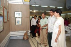Ms. Priti Rao, Dr. Gopal nene and Milind Sathe going around the exhibition
