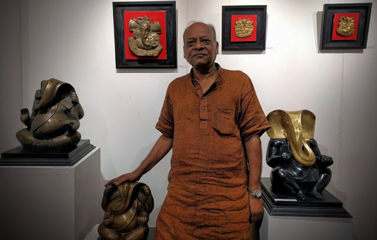 Tapas Sarkar with his Bronze Ganesha sculptures for the exhibition GANAPATI at Indiaart Gallery, Pune 