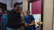 Mr Suryawanshi lighting the lamp at the inauguration of the show Beautiful Spaces at Jehangir Art Gallery
