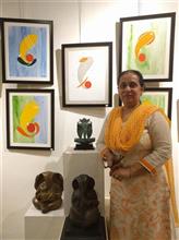 Nandita Sharma with her paintings at the second edition of Emerging Artists Show at Indiaart Gallery, Pune