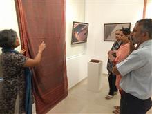 Latha talking about the show  Cotton to Cloth  to guests 