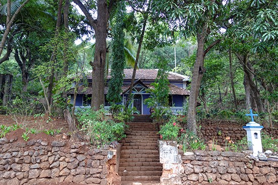 House with a Blue Cross, photograph by Milind Sathe