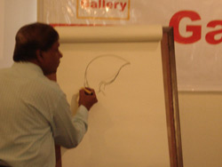 Demonstration of Cartoon Drawing by Khalil Khan