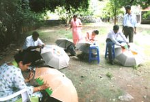 Artist - Dinkar Jadhav painting his umbrella