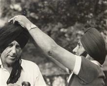 TWO EVEREST CONQUERORS - Capt Mohan Kohli tying a turban on Sir Edmund Hillary at Nandaprayag, 1977 as a symbolic 'big brother' gesture, Photo by Prem Vaidya
