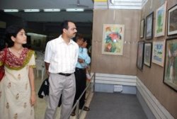 Visitors looking at the exhibition