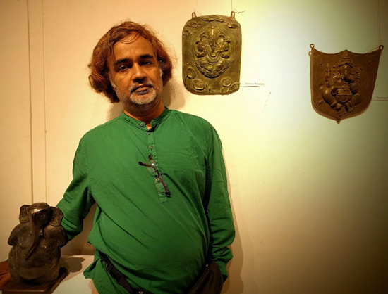 Exhibition of bronze sculptures of Ganesha at Indiaart Gallery, Pune - Tanmay Banerjee with his bronze sculptures for GANAPATI