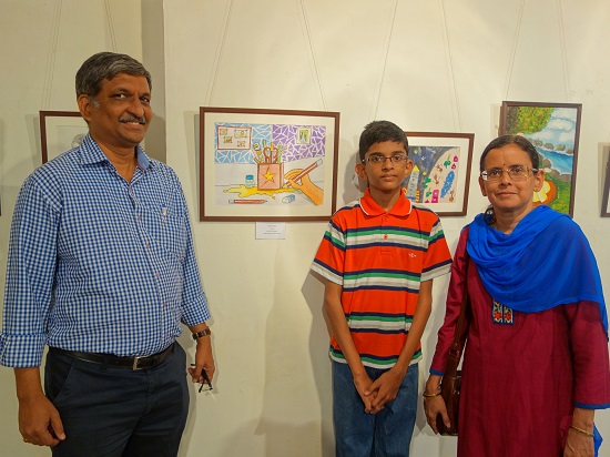 Advait Sapkal (12 years) with his painting
at Khula Aasmaan - Children's Art Exhibition
- Edition I presented by Indiaart Gallery