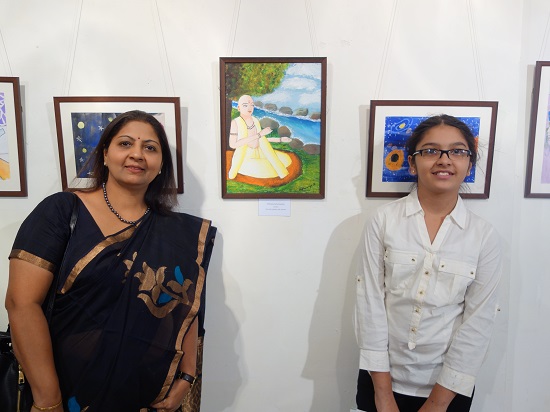 Advait Sapkal (12 years) with his parents
in front of his painting at Khula Aasmaan - Children's Art Exhibition - Edition I
presented by Indiaart Gallery