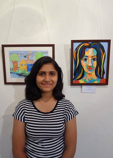 Divyangi Pandit with her painting
at Khula Aasmaan show by Indiaart - Edition I