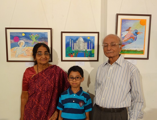 Indraneel Hajarns with his grandparents
in front of his painting at Khula Aasmaan - Children's Art Exhibition - Edition I presented