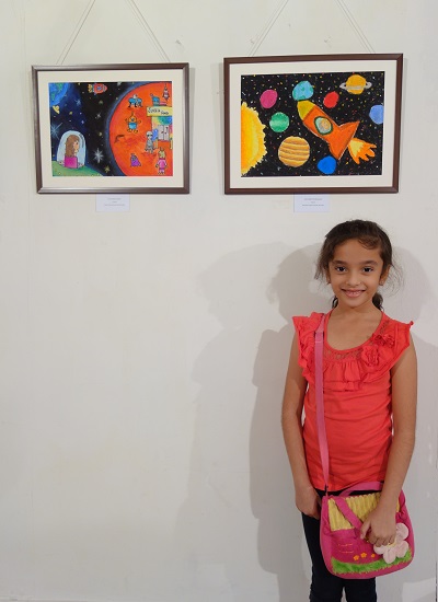 Samruddhi Mullerpatan with her painting
at Khula Aasmaan - Children's Art Exhibition
presented by Indiaart Gallery