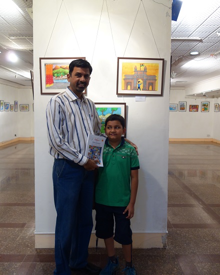 Tanmay Karve (10 years) with his painting
at Khula Aasmaan - Children's Art Exhibition -
Edition I presented by Indiaart Gallery
