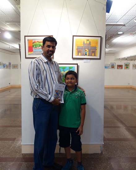 Tanmay Karve (10 years) with his painting
at Khula Aasmaan - Children's Art Exhibition -
Edition I presented by Indiaart Gallery
