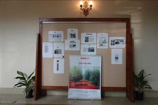 Display Board outside the gallery with media clippings about the show