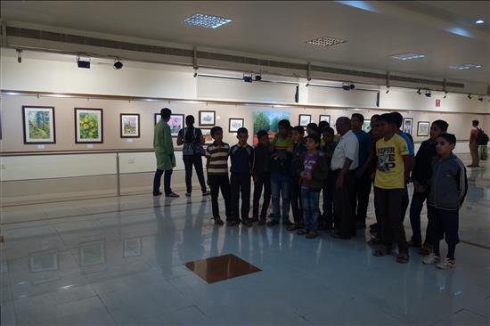 Teacher discussing the show with students