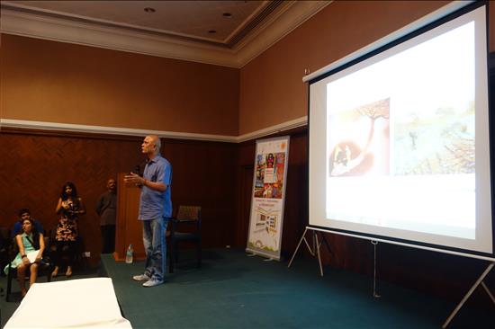 Senior artist Prabhakar Kolte delivering his talk at Harmony Hall, Nehru Centre, Mumbai