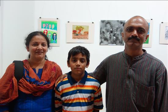 Parents with child artist