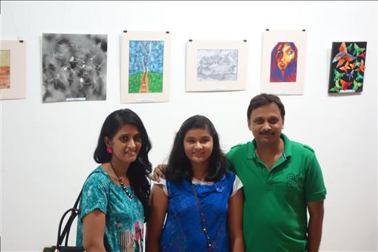 Young artist with parents