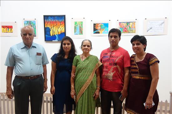 Yound artist with parents and grand parents