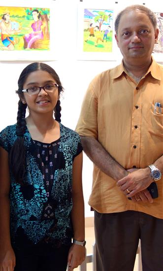 Milind Sathe with a participating child artist