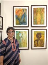 Janaki Anand with her paintings at Indiaart Gallery, Pune
