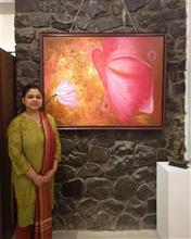Nupur Sinha with her painting at the second edition of Emerging Artists Show at Indiaart Gallery, Pune