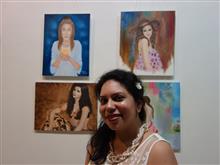 Shikha Narula with her paintings at the Emerging Artists show presented by Indiaart.com at Nehru Centre, Mumbai 