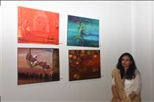 Rupal Buch with her paintings at the Emerging Artists show presented by Indiaart.com at Nehru Centre, Mumbai