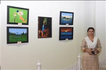 Sumita Dey with her paintings at the Emerging Artists show presented by Indiaart.com at Nehru Centre, Mumbai