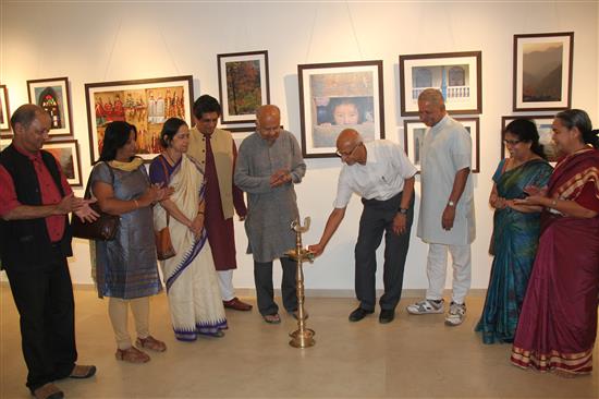 At the inauguration of Milind Sathe's photography show at Indiaart Gallery
(L to R) Milind Sathe, Smt. Ganesh, Smt. Mangala Narlikar, Dr. Somak Raychaudhury, Dr. Jayant Narlikar