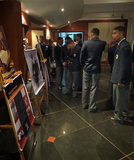 Cadets of National Defence Academy looking at paintings by Russian children - 2