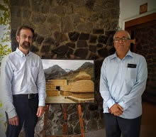 Dr. Stewart Gordon and Shashi Sharma with Milind Sathe's picture of Tabo monastery at Indiaart Gallery, Pune