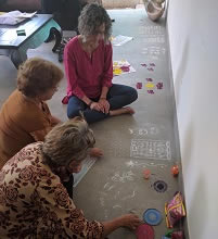 Participant enjoying the Rangoli workshop  at Indiaart Gallery - 1 