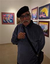 Dr Mohan Agashe at the exhibition of paintings by Russian Children at indiaart Gallery