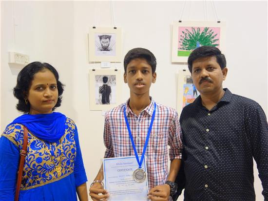 Vedant Khanvilkar his medal and certificate along with parents at Khula Aasmaan exhibition at Mumbai - October 2017 