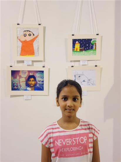  Ananya Kanungo with her painting at Khula Aasmaan exhibition
