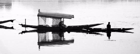 Calm Reflection, Dal Lake, Srinagar, photograph by Kumar Mangwani