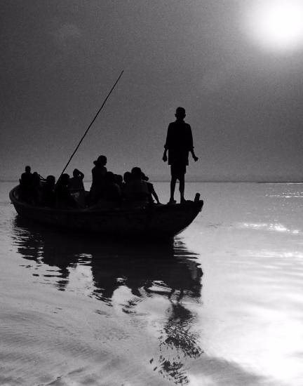 Homeward Bound - Boating down the Gangas, Varanasi, photograph by Kumar Mangwani