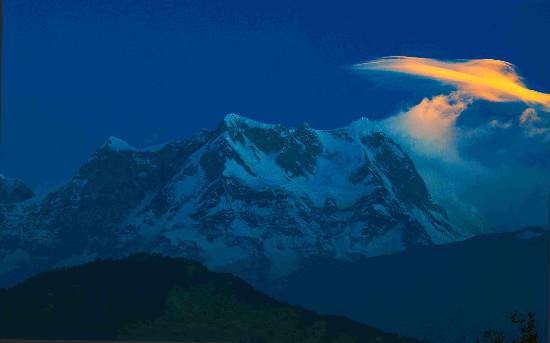 One tiny cloud over peak Chaukhamba, photograph by Ashok Dilwali
