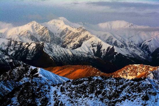 Sun trying to show up, near Khardung La,Ladakh., photograph by Ashok Dilwali