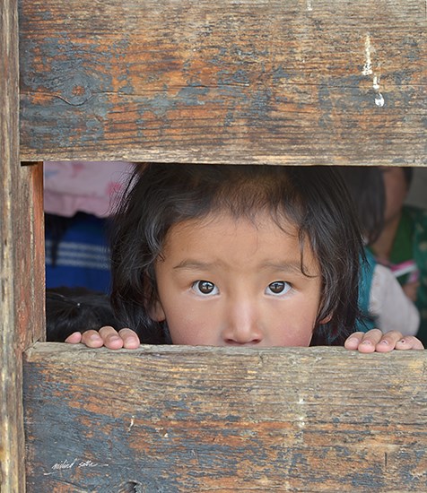 Young one at Ura festival, photograph by Milind Sathe