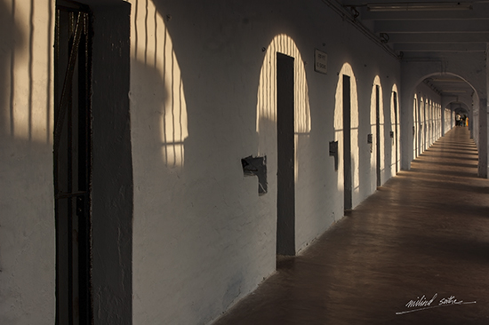painting by Milind Sathe - Walking the corridor at Cellular Jail