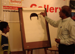 Demonstration of Cartoon Drawing by Khalil Khan