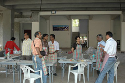 Sculptors working on creating sculptures in ceramics