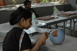 Sculptors working on creating sculptures in ceramics