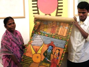 Karuna Chitrakar with her painting on Ramayana