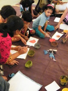 Children enjoying paintings using Vegitable Dyes colours