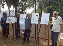 Left to right - Khalil Khan, Vaijnath Dulange, S. D. (Shi Da) Phadnis and Mangesh Tendulkar with their cartoons
